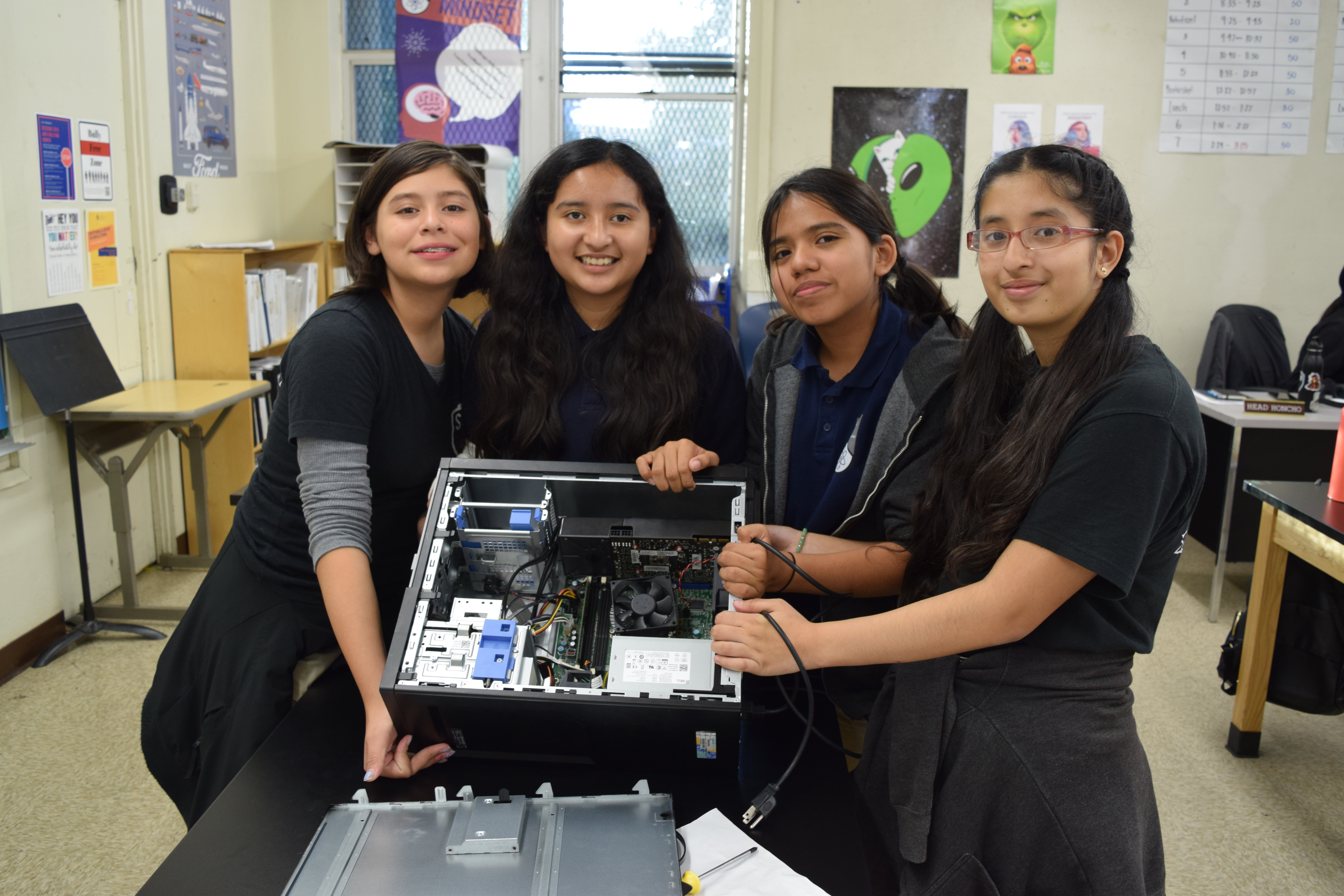 students showing a computer project